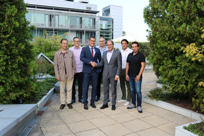 Dr. Markus Meier mit Adrian Schmitter und dem Kardiologie-Team 2019