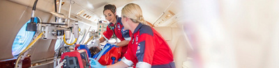 Emergency workers in air ambulance