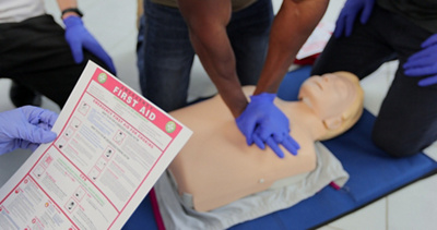 Person performing first aid CPR