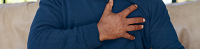 Man holding his chest
