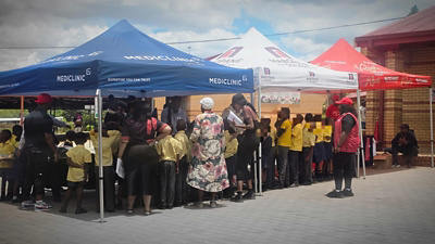 Learners collecting the uniform