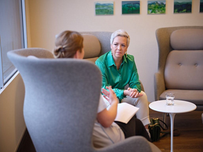 A woman relaxing on the sofa. 