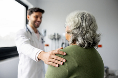 doctor speaking to patient