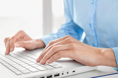 Keyboard, hands, operator.