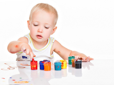 Little baby paint by his hands.