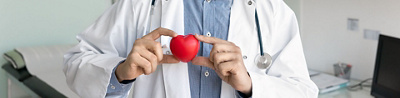 Doctor with a heart in his hand